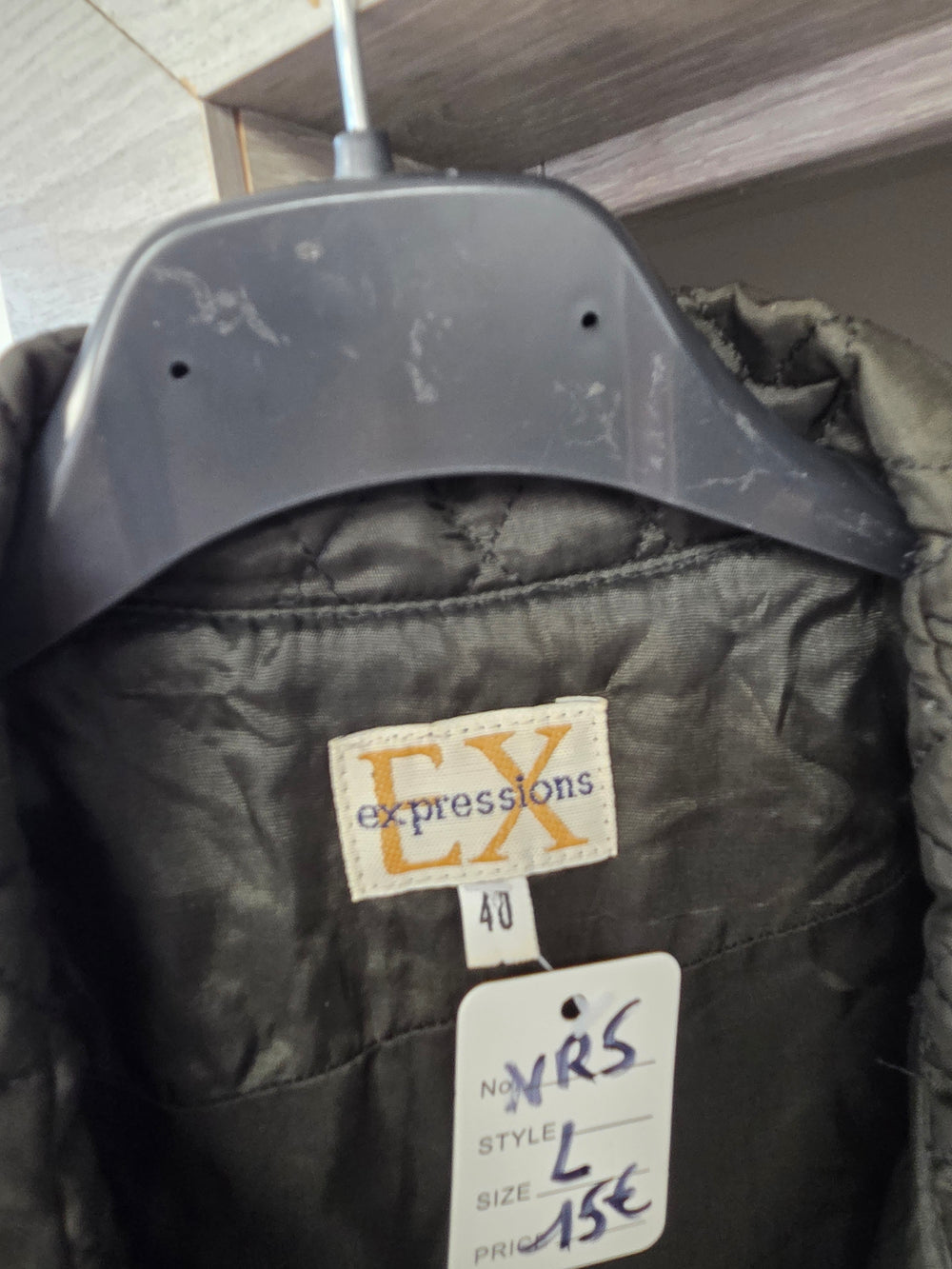 Veste kaki et noire taille L